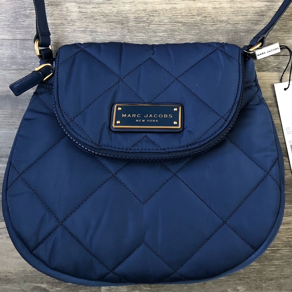 Marc Jacobs Cross Body Bag with gold hardware.